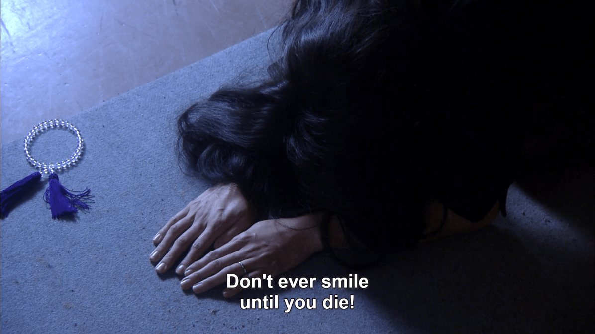 Mita don't smile.png